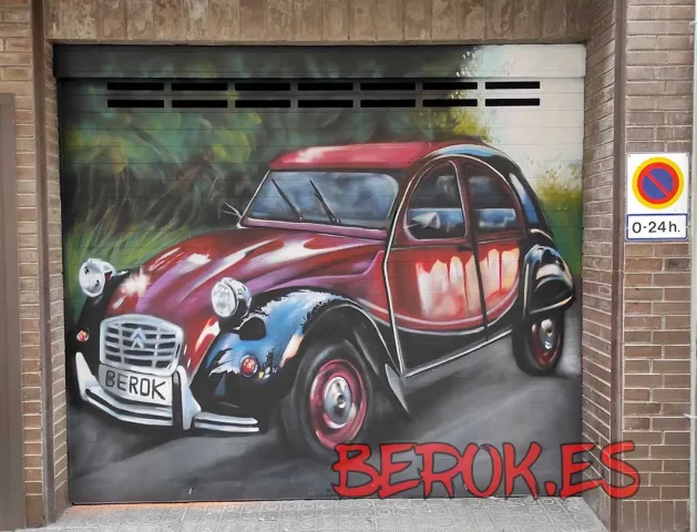 Graffiti garaje con coche clásico en puerta de parking decorada