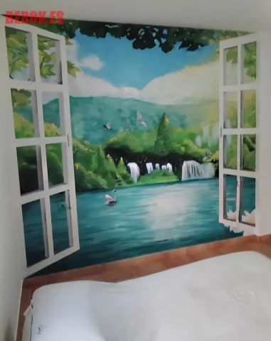 Mural interior con ventana pintada, lago azul, cascadas, montañas y cisne en primer plano.