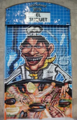 Persianas pintadas con graffiti de cocinero restaurante El Suquet Barcelona