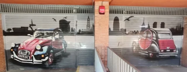 Graffiti en puertas de garaje con coches clásicos Citroën 2CV