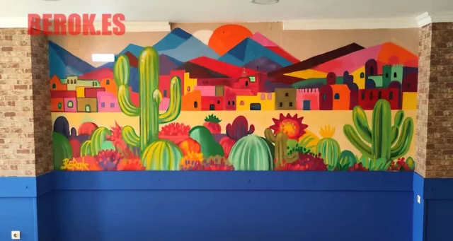 Mural mexicano con cactus gigantes y paisaje colorido