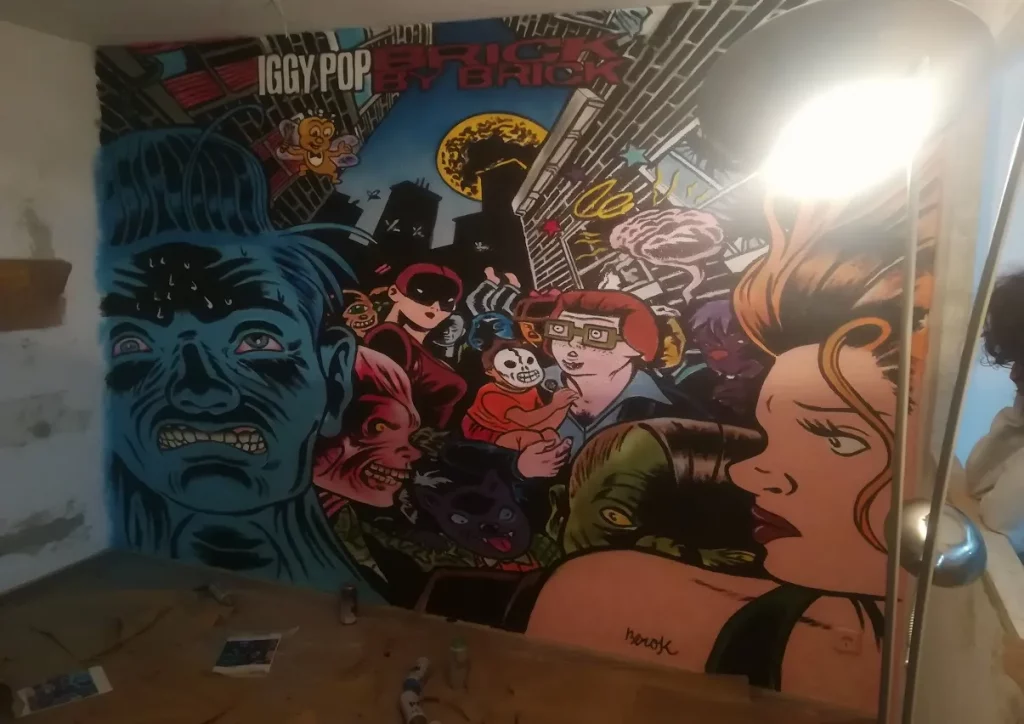 Mural graffiti interior de la portada del disco Brick by Brick de Iggy Pop ilustración estilo cómic underground
