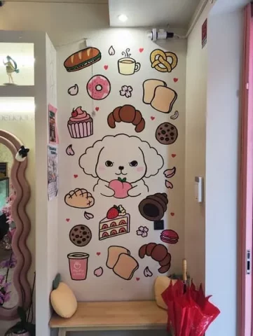 Mural decorativo infantil para pastelería. Mural infantil estilo manga con perro y dulces en pastelería.