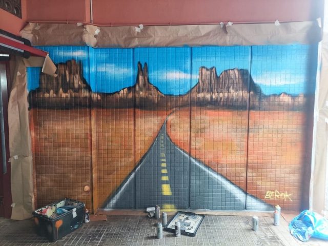Graffiti mural Arizona gran cañón parking con carretera infinita