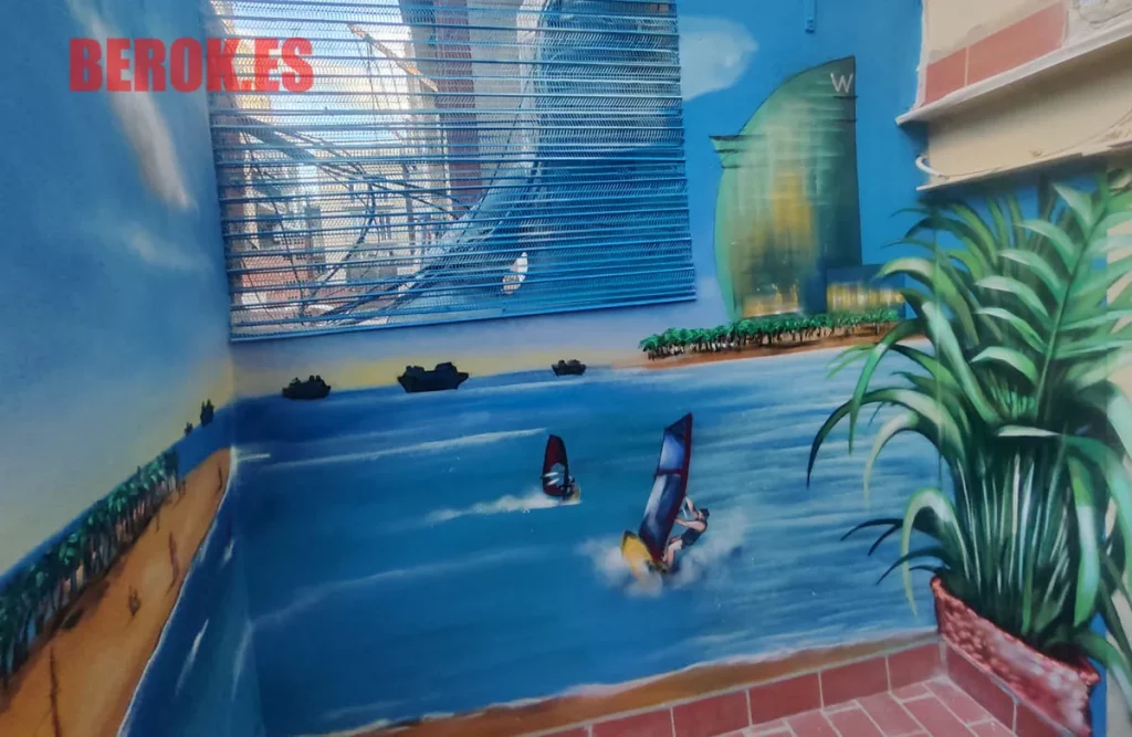 Graffiti playa con windsurf, mar azul y hotel vela estilo barcelona