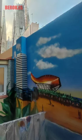 Mural pez y torres mapfre en barcelona Graffiti skyline de barcelona con el pez junto a las torres mapfre y playa urbana
