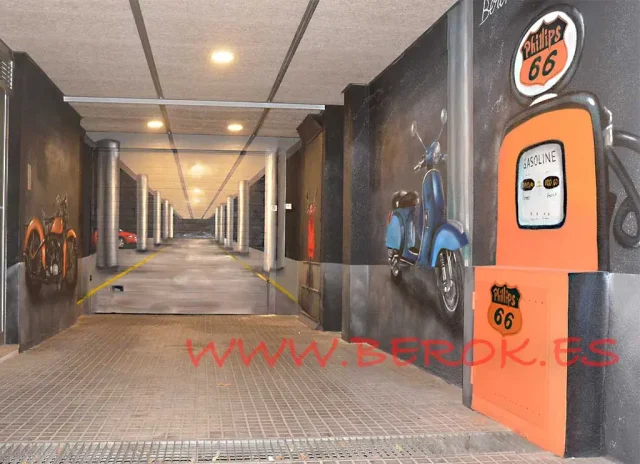 trampantojo-3d-parking-motos Trampantojo 3D en un parking con columnas en perspectiva, motos clásicas y un surtidor de gasolina naranja.